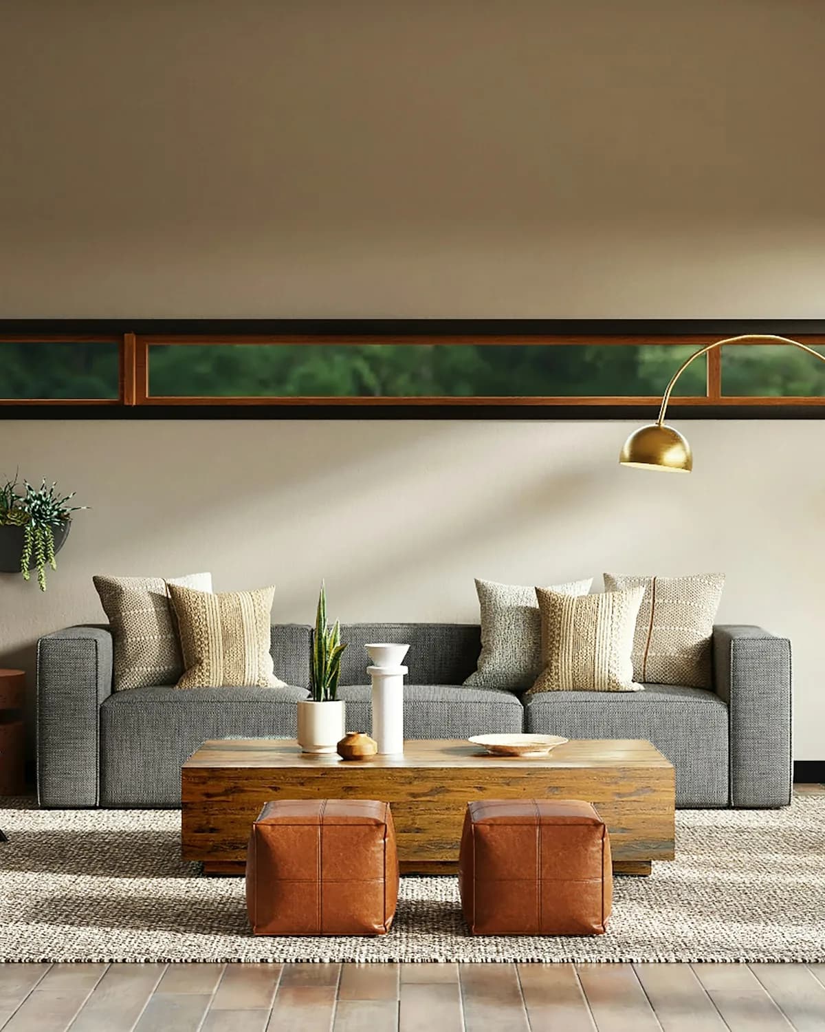 A warm living room with a green sofa and morning light